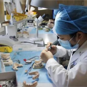 technician works on dental laboratory
